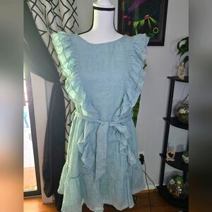Mint ruffled sleeveless summer dress.
